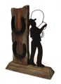Cowboy w Horseshoes on Base Statue