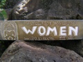 Aged Women Tiki Sign Hand Carved Bathroom Decor
